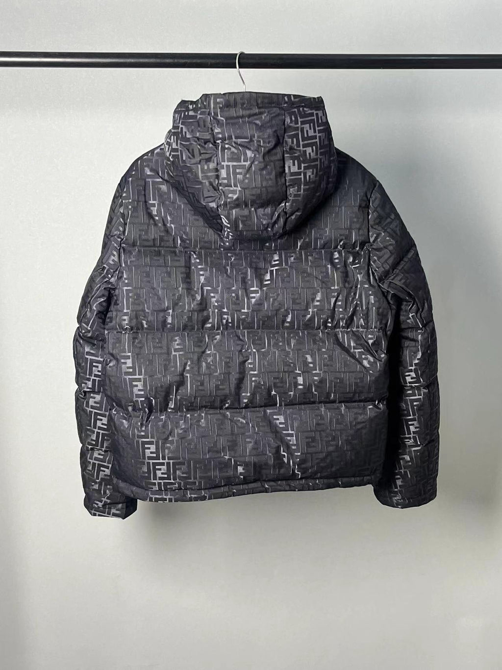 Fendi women’s black FF jacquard hooded puffer jacket